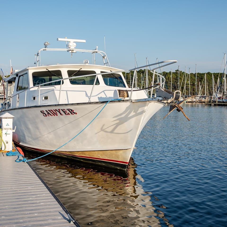 The Sawyer charter boat beside the dock.